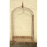 A 3' 10 3/4" wrought iron arbor bench - 8' to top of finial