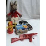 A vintage toy Marx Toys machine gun with hand crank action, tin plate Highway Patrol car, a boxed "