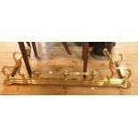 A Victorian cast brass fire fender