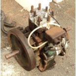 A vintage Wico stationary engine and parts
