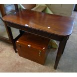 A 36" 19th Century mahogany single drop-leaf table with rounded reeded top, set on square tapered