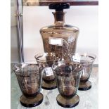 An Art Deco decanter and four glasses