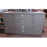 A 4' 10" mid 20th Century painted wood two part plan chest with panelled sides and ten drawers - "