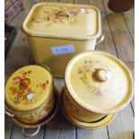 A collection of decoupage kitchenware including bread bin and canisters