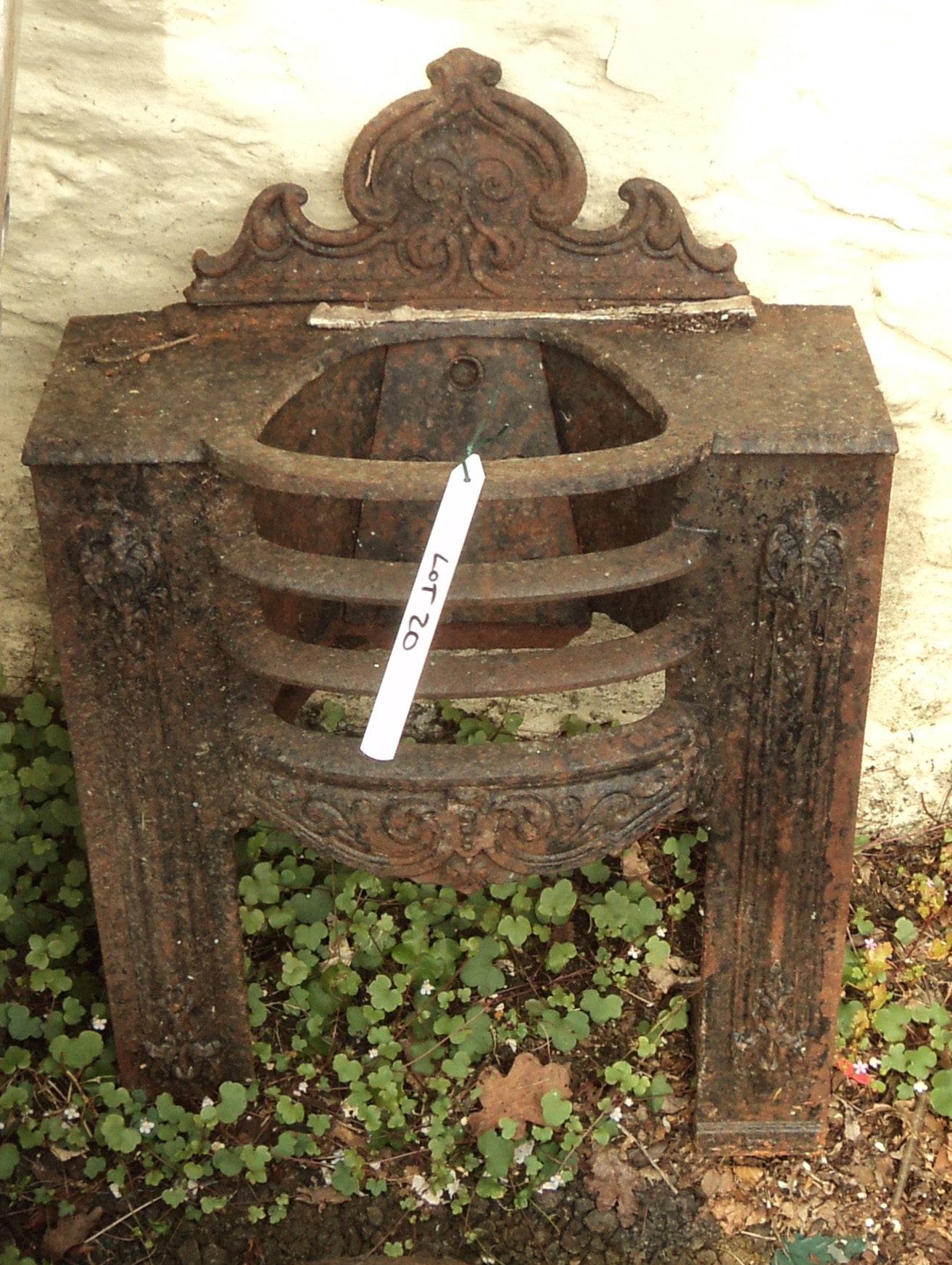 A cast iron fire grate