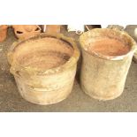 A 20 1/2" weathered terracotta plant pot - sold with a 15 1/2" similar