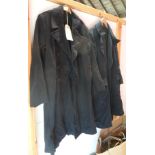 A Second World War Royal Navy officer's great coat dated 1944 with replacement buttons and loose