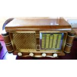 A continental Art Deco style radio in a wooden case