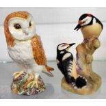 A Beswick barn owl and a Worcester woodpecker group