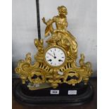 A 19th Century French gilt spelter figural mantel clock with lady holding a basket and squirrel,