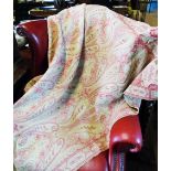 A wool paisley pattern piano shawl