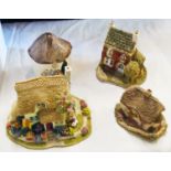 A collection of unboxed Lilliput Lane and other makes of resin model cottages, church, etc.