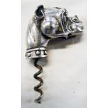 A silver plated corkscrew with cast boxer dog head pattern handle