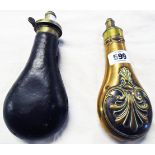 A mid 19th Century leather clad powder flask with silver plated James Dixon dispenser and