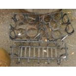 A pair of plant pot stands formed from horseshoes - sold with another