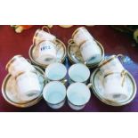 A set of twelve early 20th Century Aynsley coffee cans and saucers bearing retailer mark Alfred