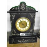 A late Victorian black slate and marble cased mantel timepiece with eight day movement