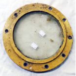 A porthole window with later painted finish