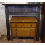 A 4' 5" early 20th Century fire surround with curved recess and flanking reeded half columns