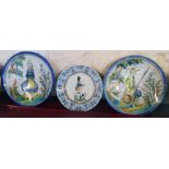 Two continental pottery dished wall plates and a French Gien bowl with soldier decoration