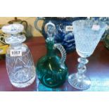 A cut glass mallet shaped decanter - sold with a green glass claret jug with old repair to handle