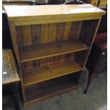 A 33" waxed pine three shelf open bookcase