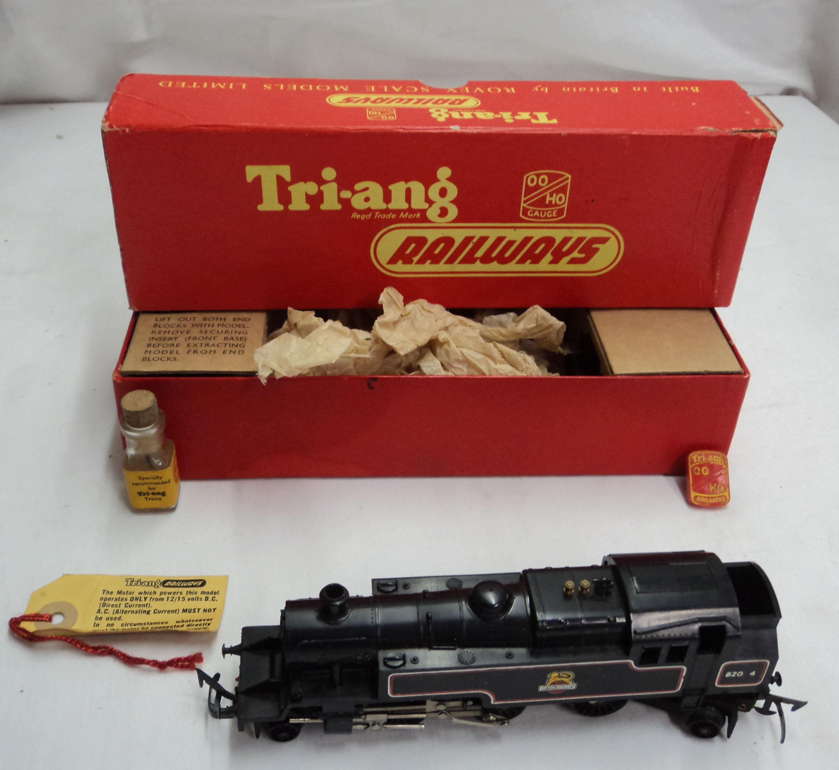 A Tri-ang OO gauge R.59 2-6-2 Class 3MT tank loco in black BR livery, complete in box with oil,