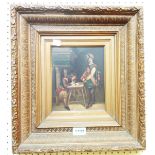 An ornate gilt framed 19th Century oil on metal panel, depicting figures in an interior signing