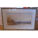 C. Pearson: a gilt framed watercolour depicting a scene with watering cattle, seated figure and town