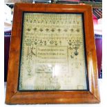 A Georgian pictorial and alphabet sampler by Susanna Genge dated 1811, in original maple frame