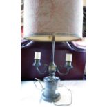 A pewter two branch bouilotte table lamp with fabric shade