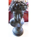 A verdigris patinated resin bust of Michelangelo's David, on wood socle base