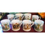 Eight George V to VI commemorative mugs including some Bovey Pottery