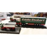 Three boxed Atlas Editions Eddie Stobart lorries comprising Volvo FH Fridge Trailer, Scania