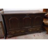 A 5' antique polished oak and cross banded mule chest with three internal small drawers and triple