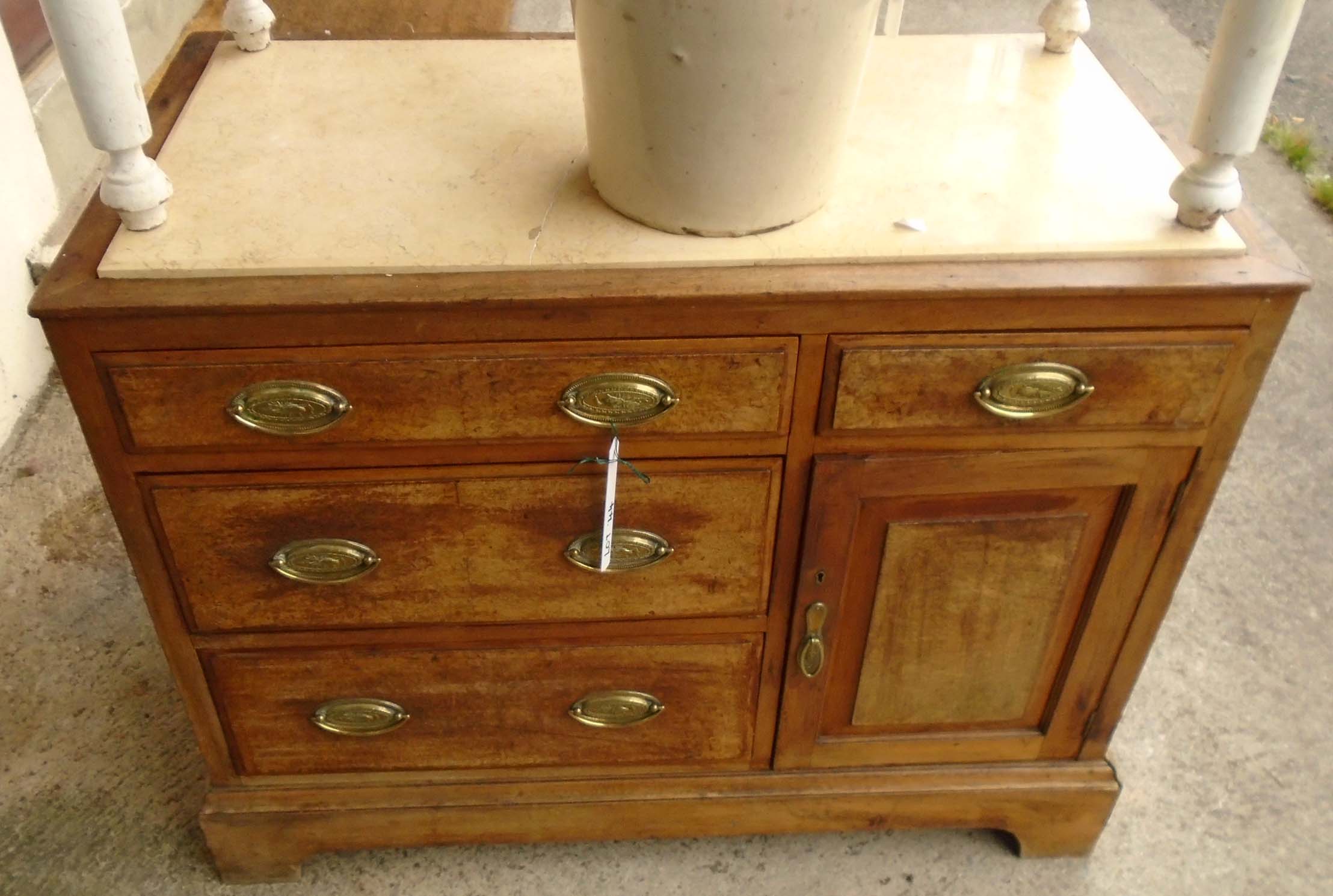 A continental washstand chest with yellow marble inset top over two short drawers, flight of three