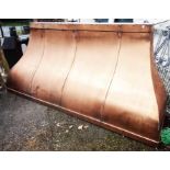 A large copper clad fire hood - width 7' 10"