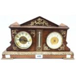 A late Victorian brass mounted walnut desk timepiece/thermometer/aneroid barometer of