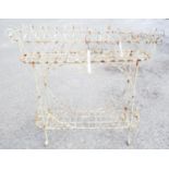 An antique wirework planter on stand - length 37 1/2"