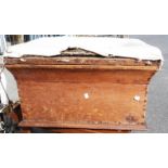 An antique pine lift top box with remains of upholstered top - made from an ottoman - length 27"