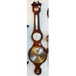 A reproduction mahogany and strung banjo barometer/thermometer by Comitti of London with storm scale