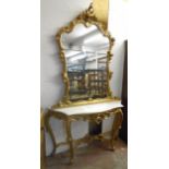 A 4' 2 1/2" reproduction Rococo style gilt wood console table with shaped marble top, pierced