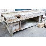 A vintage wooden work bench - length 7' 11"