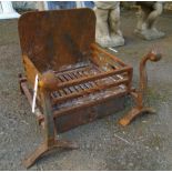 A 14" wrought iron fire basket, pair of fire dogs and an ashtray