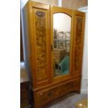 A 3' 11" Edwardian satin and burr walnut wardrobe with hanging space enclosed by a mirror panel door