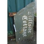 A piece of cut slate with painted house name 'Cliffside Cottage' - 32" X 16 1/2"