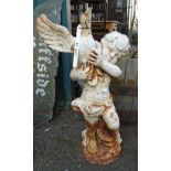 A 26 1/4" white painted cast iron figure of a boy holding a bird