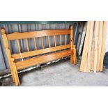 A modern pine framed double bedstead - 4' 8"