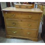 A 36" 19th Century pitch pine chest of three long graduated drawers, set on bracket feet, with