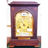 An early 20th Century German stained wood cased mantel clock with decorative printed dial and HAC